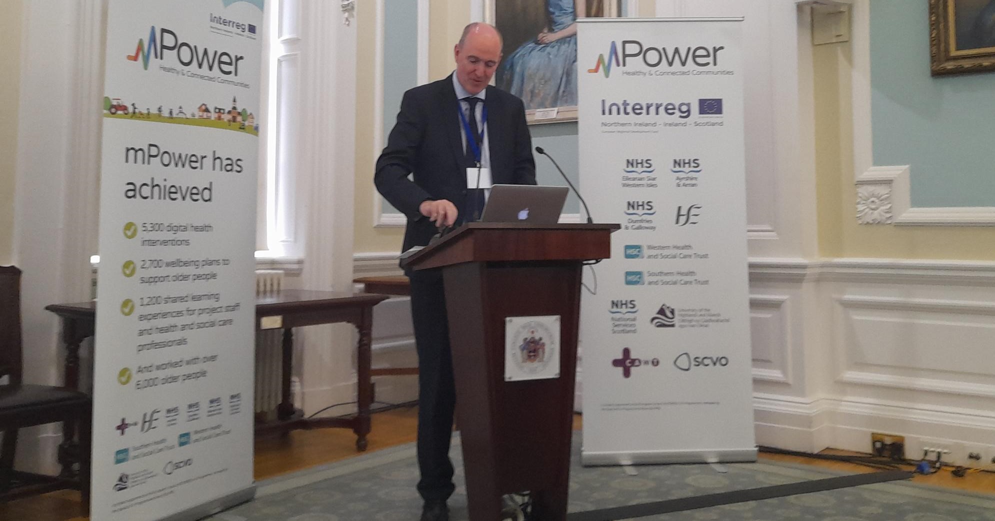 Neil Guckian, Director General of CAWT, addresses the audience at the mPower closing event