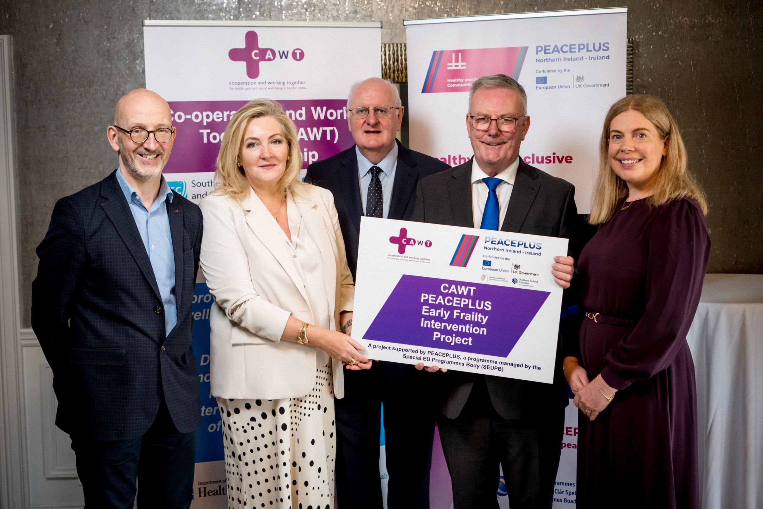 Image of speakers / VIPs at the CAWT PEACEPLUS Early Frailty Intervention Project launch in Omagh on 1st Oct 2025